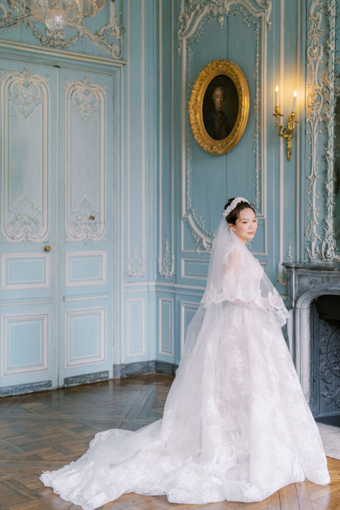 Bride getting ready at Château de Champlâtreux Wedding